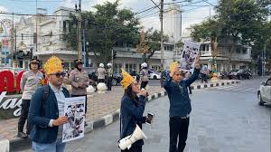 Kolaborasi Mahasiswa UB Kampanyekan Berkendara Tanpa Asap Rokok