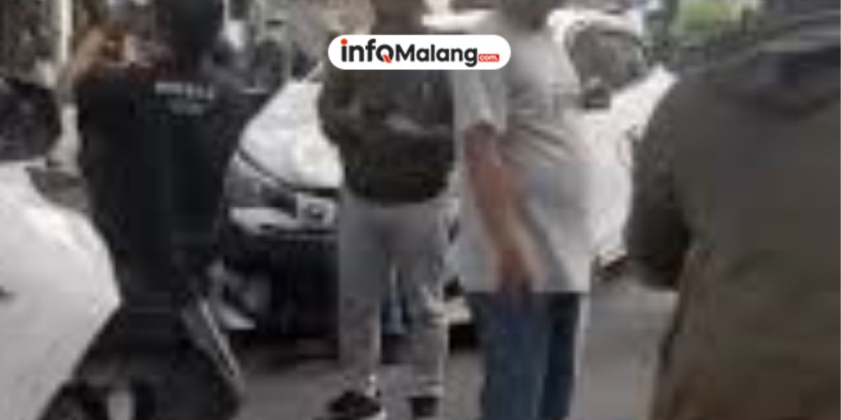 Sebuah Mobil Putih Masuk ke Dalam Kolam di Area UB pada Minggu Sore