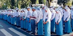 SMAN 8 Kota Malang Gelar Upacara HUT ke-80 RI di Jalan Veteran